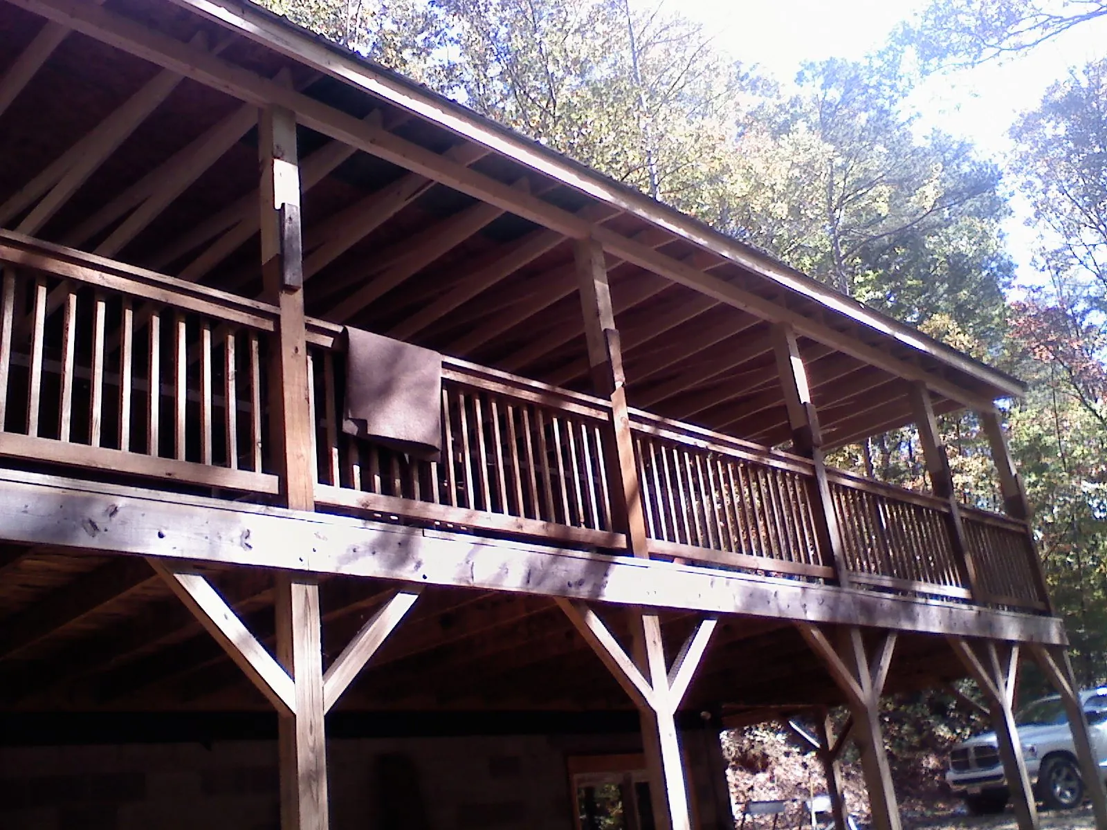 Timber framing under a new elevated porch and deck — Roof Leak Repair in Woodlake by Roofing Brothers